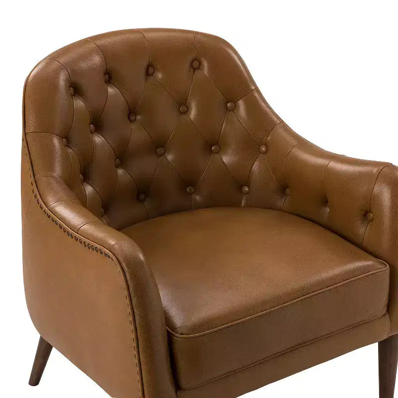 Poltrona a barilotto imbottita in vera pelle, larghezza 72,4 cm, con gambe in legno massello