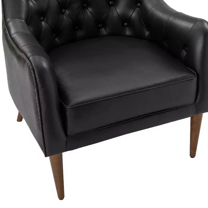 Poltrona a barilotto imbottita in vera pelle, larghezza 72,4 cm, con gambe in legno massello