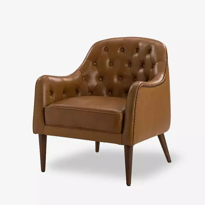 Poltrona a barilotto imbottita in vera pelle, larghezza 72,4 cm, con gambe in legno massello