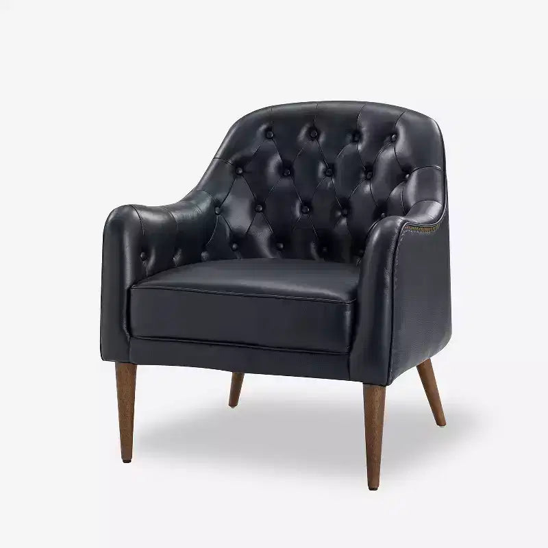 Poltrona a barilotto imbottita in vera pelle, larghezza 72,4 cm, con gambe in legno massello